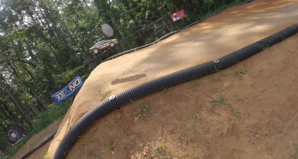 Tamiya TT-02 Celica GT-Four jumping the step-up from the driver’s view at the 1/8 buggy track