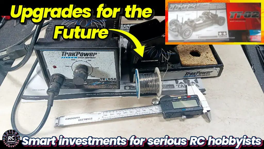 A TrakPower TK 950 soldering station, 63-37 Tin Lead Rosin Core Solder Wire, and a digital caliper, representing highly recommended optional tools for future RC car upgrades and precise maintenance