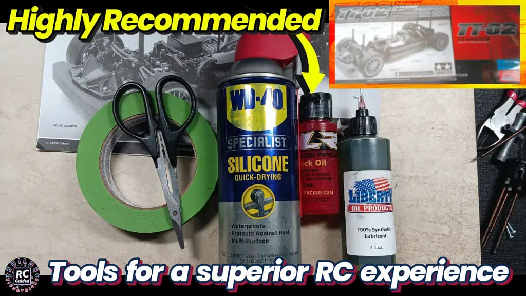 A selection of highly recommended RC tools including Tamiya masking tape, Lexan curve body scissors, WD-40 Specialist Silicone spray, TRL Losi shock oil, and Liberty bearing oil, for a superior Tamiya TT-02 build and maintenance.